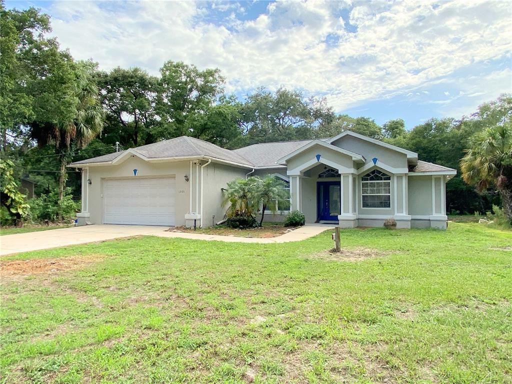 Property Photo:  13121 Barney Dr  FL 34669 