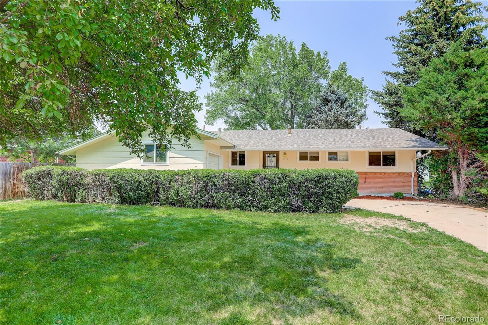 Property Photo: 8653 W Burgundy Drive CO 80123