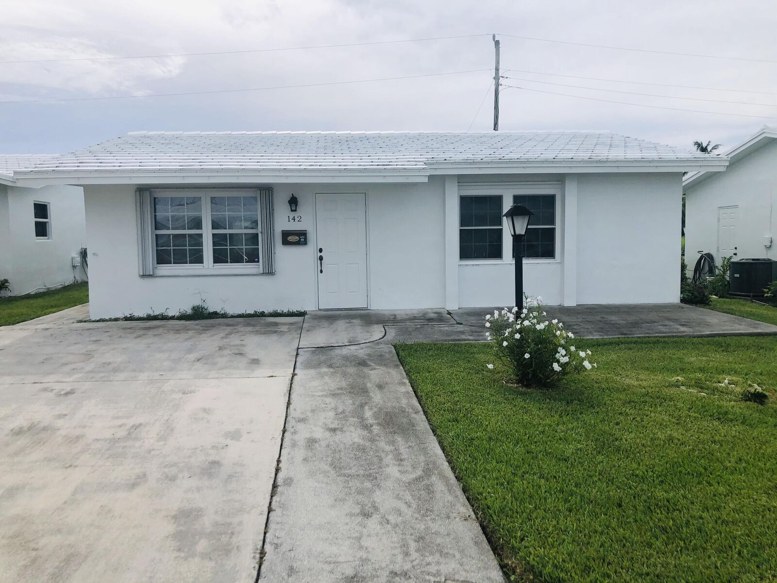 Property Photo:  142 NW 10th Court  FL 33426 