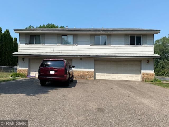 Property Photo:  9848-9858 Tyler Street NE  MN 55434 