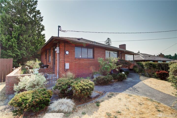 Property Photo:  8828 42nd Ave SW  WA 98136 