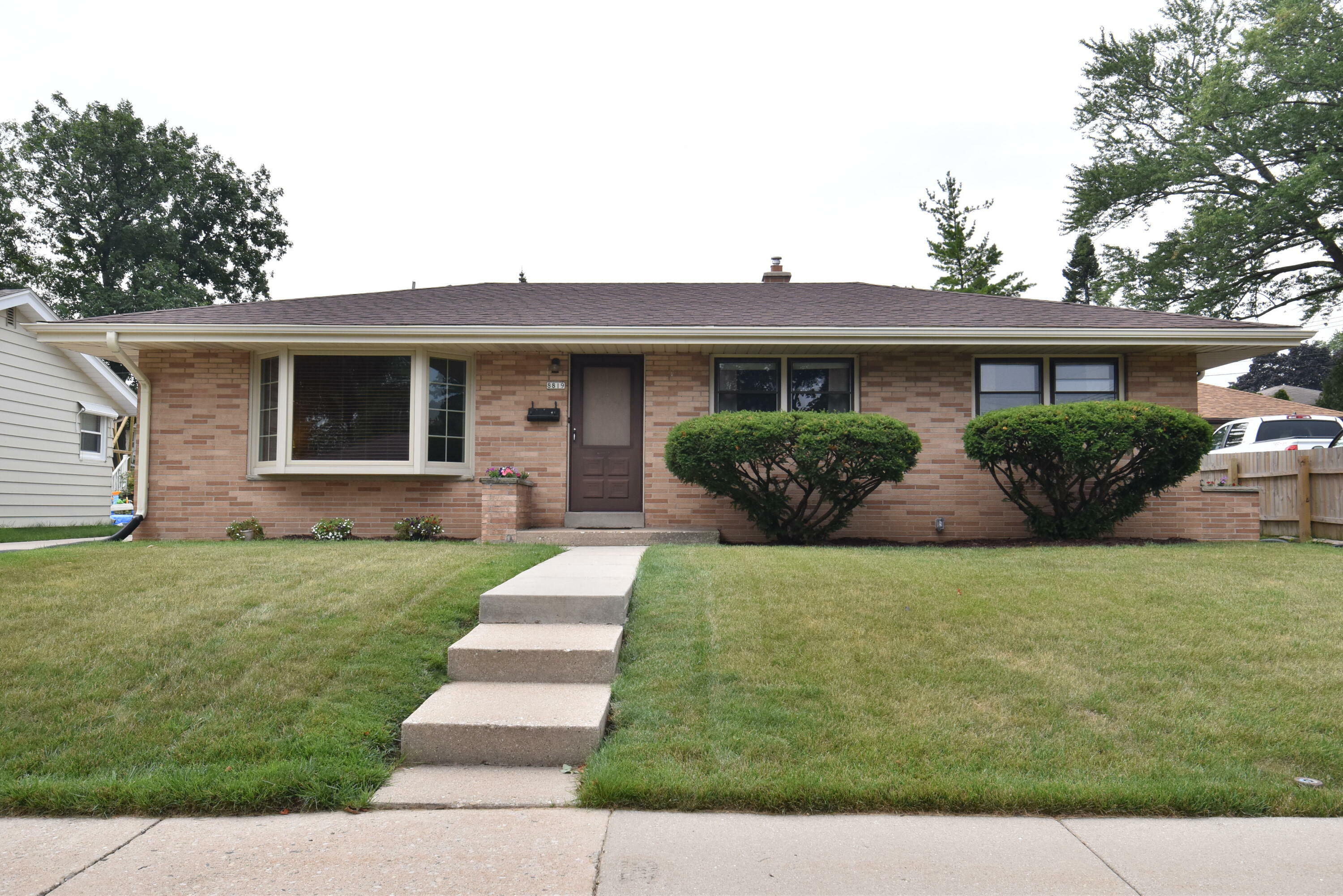 Property Photo:  8819 W Holt Ave  WI 53227 