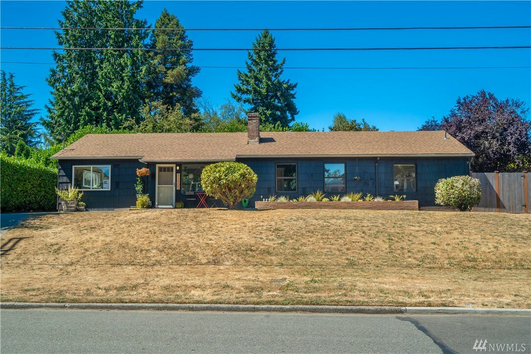 Property Photo:  11905 64th Ave S  WA 98178 