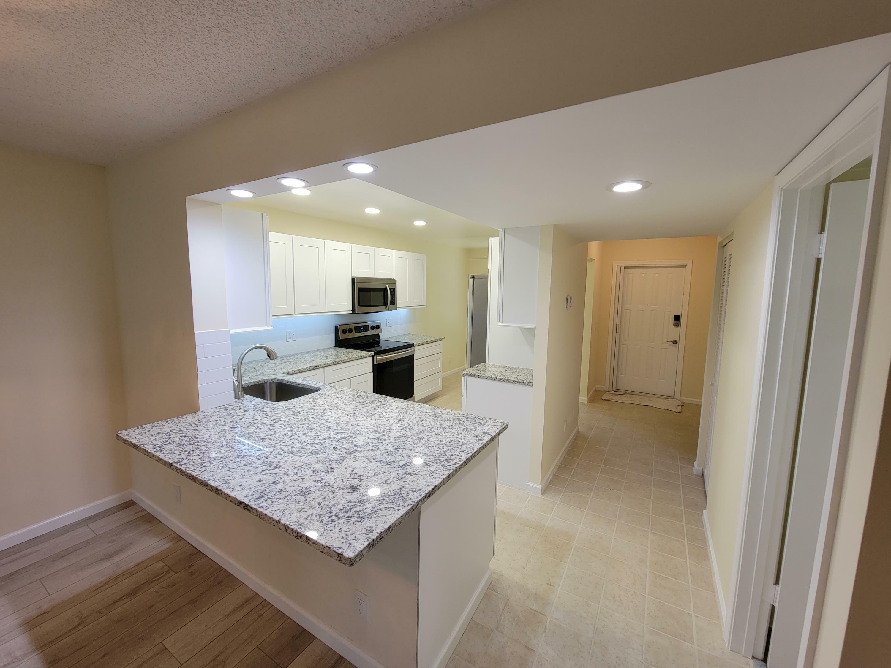 Property Photo:  10187 Mangrove Drive 104  FL 33437 