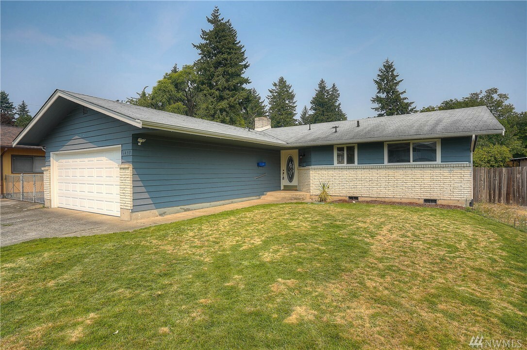 Property Photo:  1453 N Villard St  WA 98406 