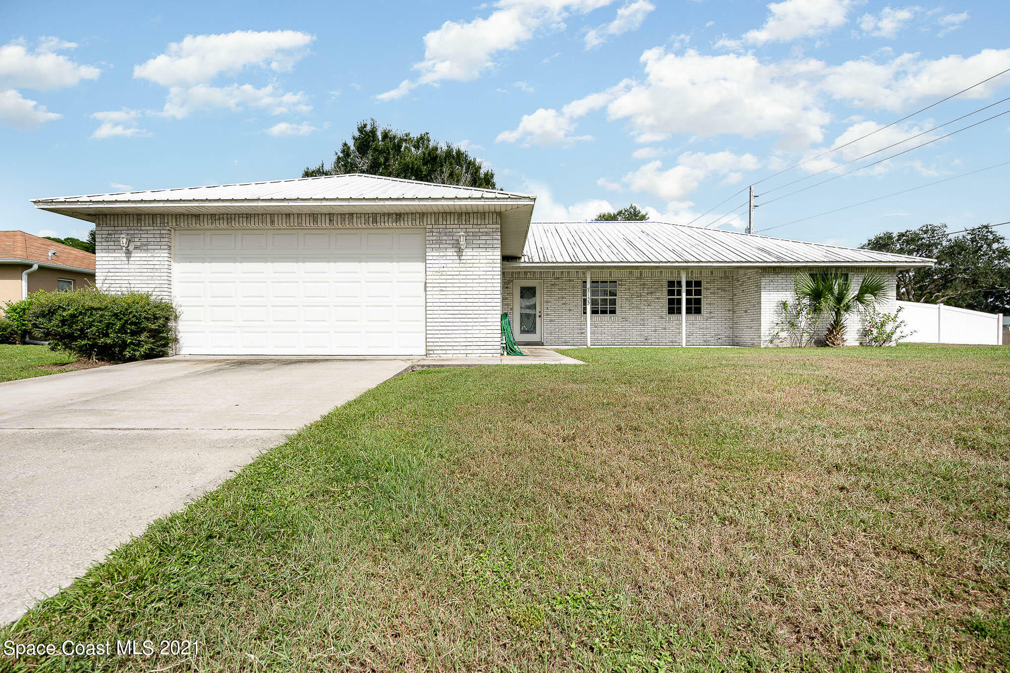 Property Photo:  7155 Venus Avenue  FL 32927 