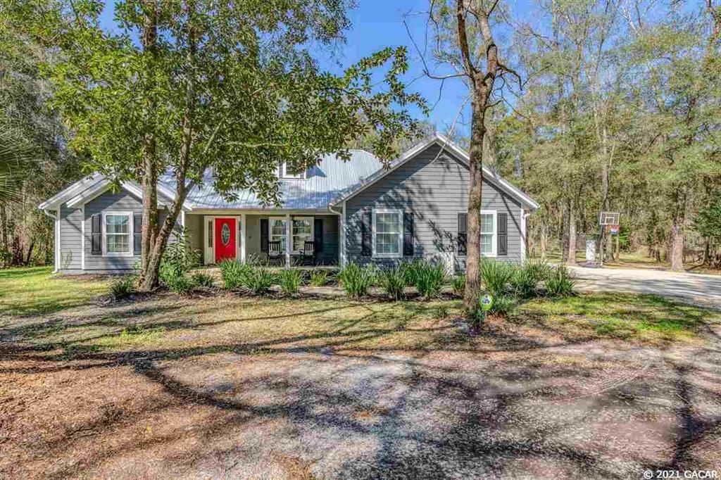 Property Photo:  10030 SW Archer Boulevard  FL 32608 