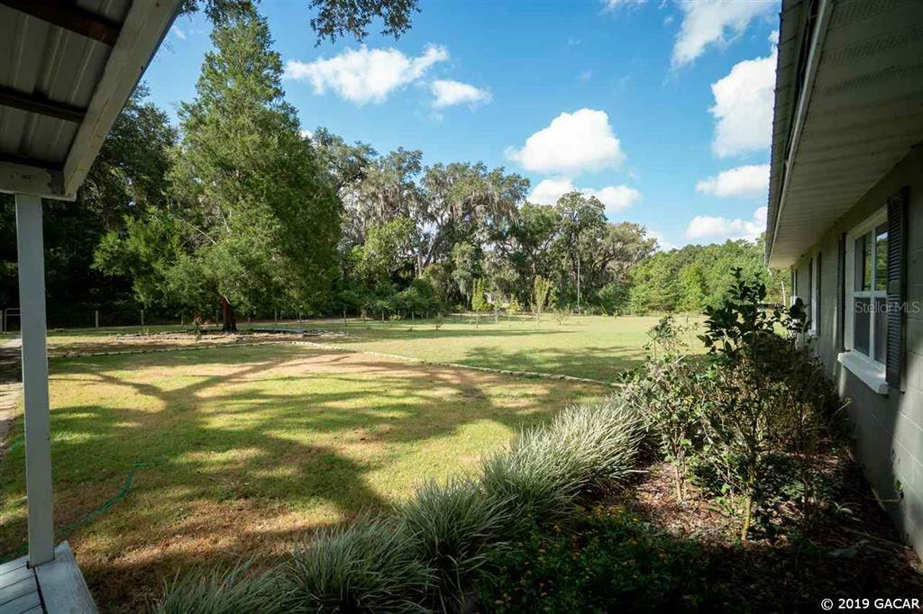 Property Photo:  5502 SW 57th Avenue  FL 32608 