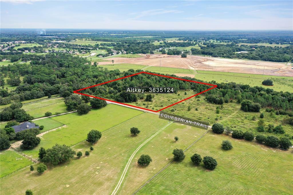 Property Photo:  Equestrian Trail  FL 32776 