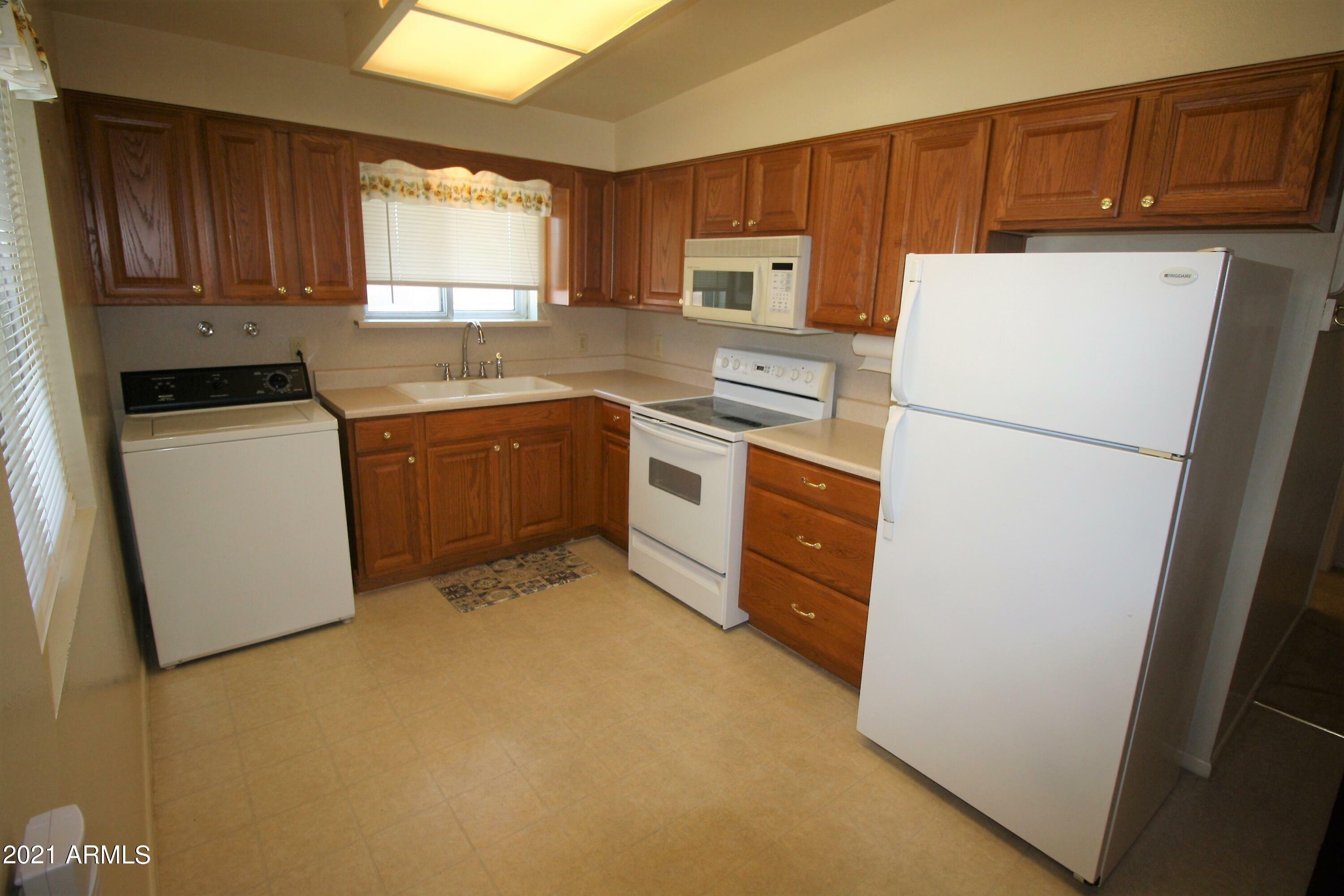 Property Photo: 10442 N 105th Avenue AZ 85351