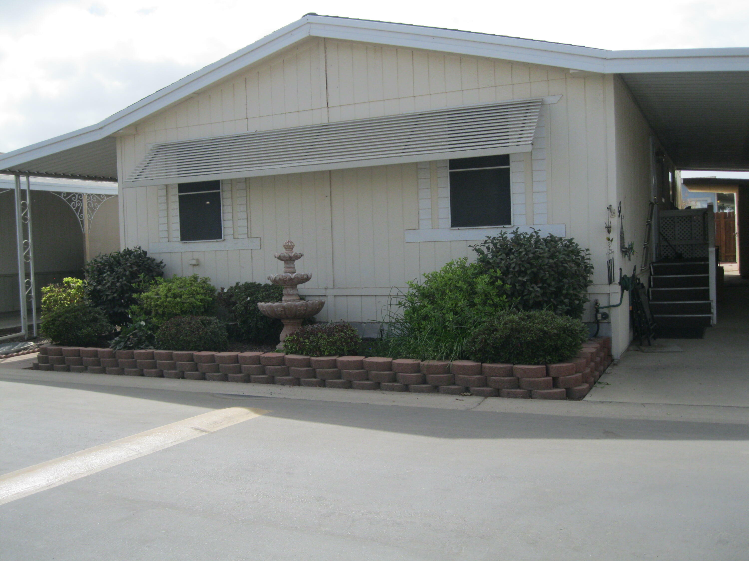 Property Photo:  2459 N Oaks Street 53  CA 93274 