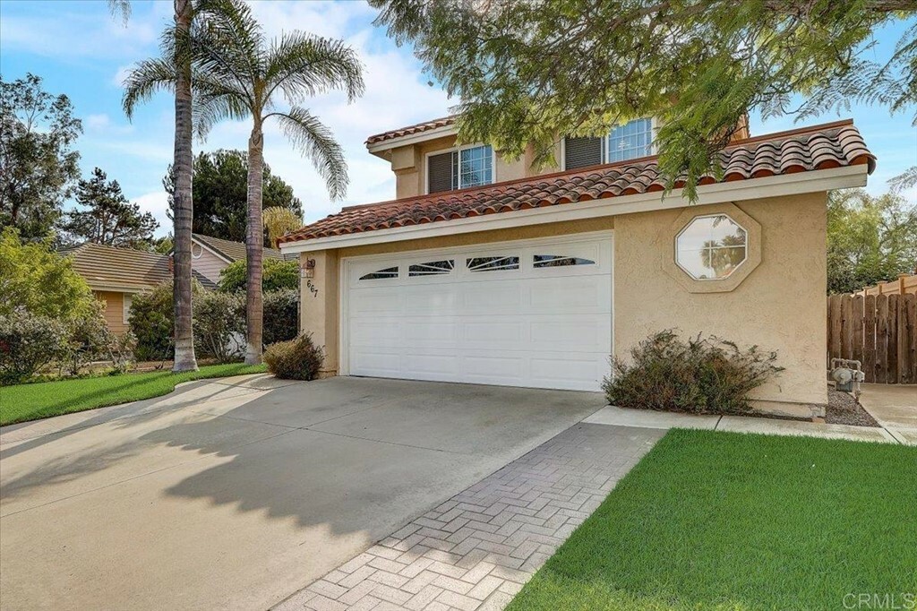 Property Photo:  667 Boysenberry Way  CA 92057 