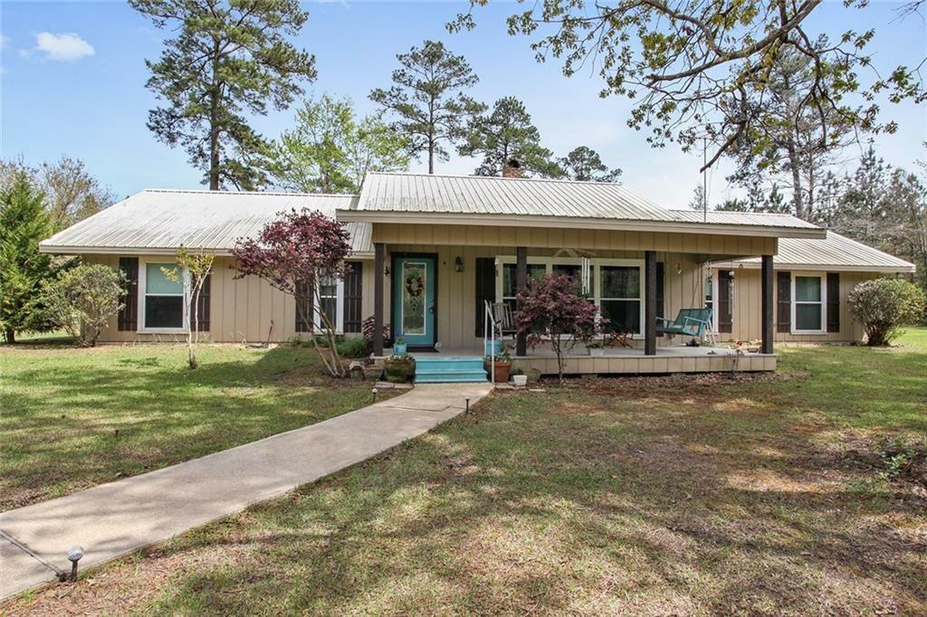 Property Photo:  300 Bob Ensminger Rd  LA 70634 