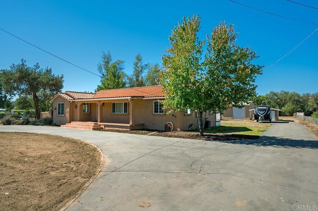 Property Photo:  11424 Moreno Avenue  CA 92040 