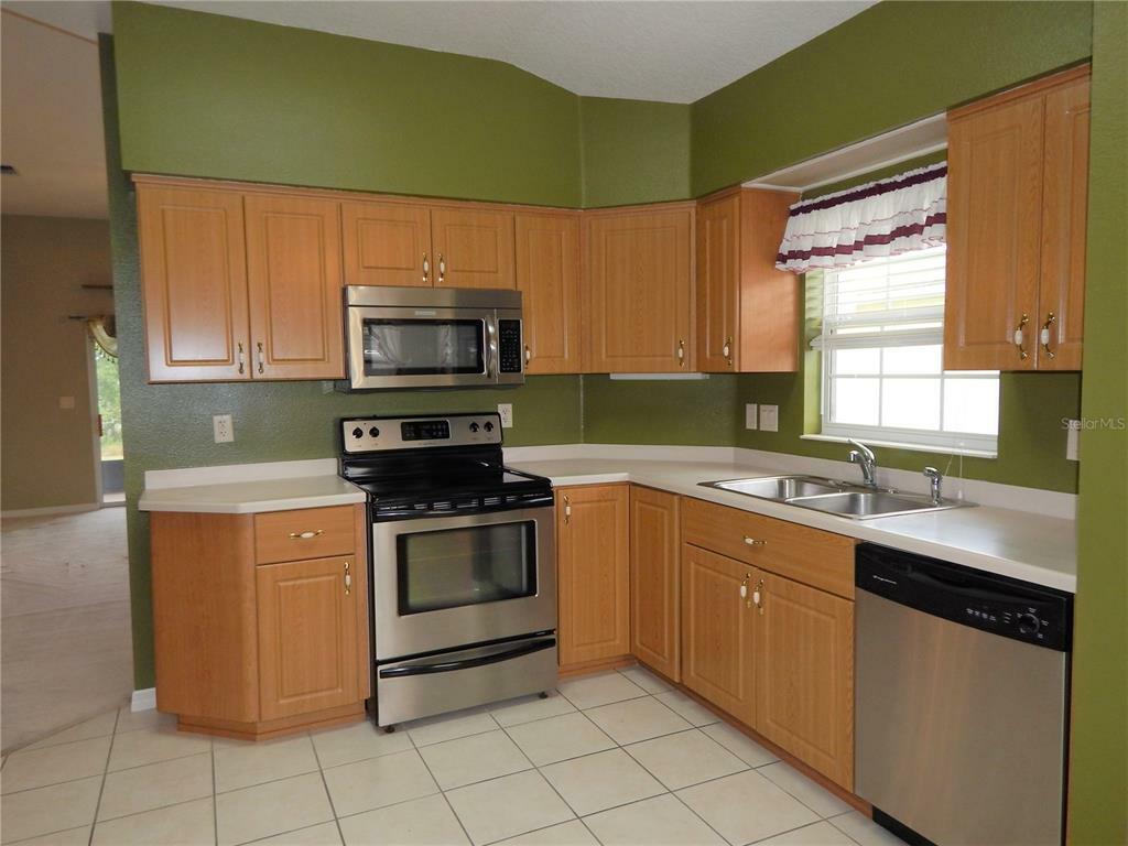 Property Photo:  5715 Illumination Lane  FL 34748 