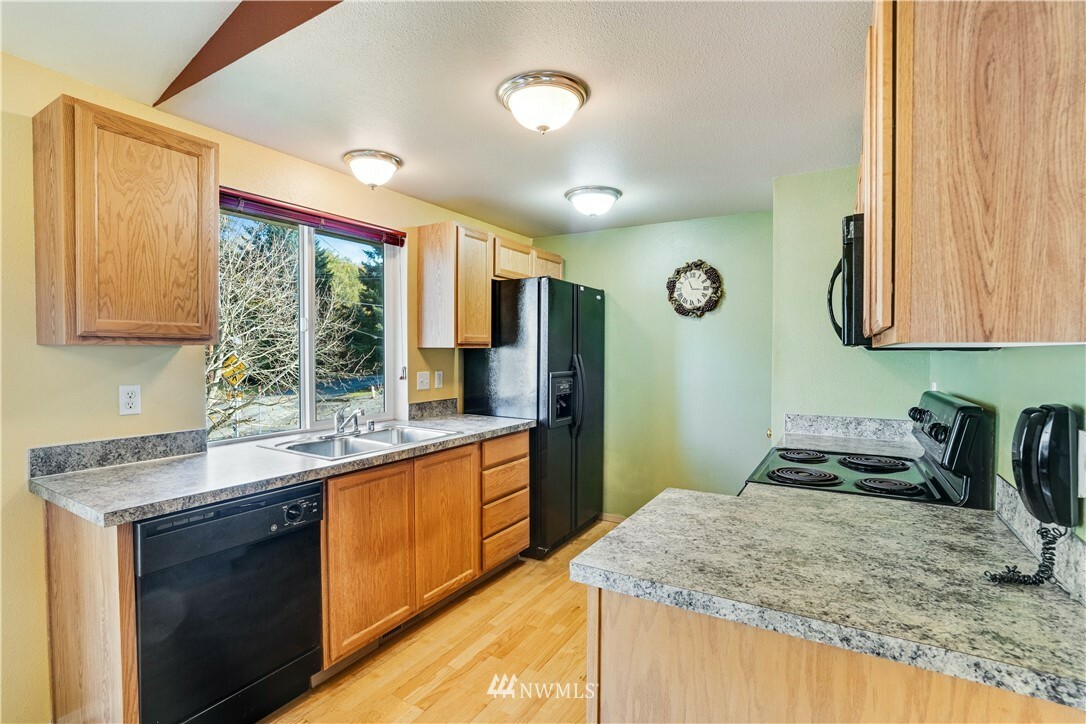 Property Photo:  6405 E Roosevelt Avenue  WA 98404 