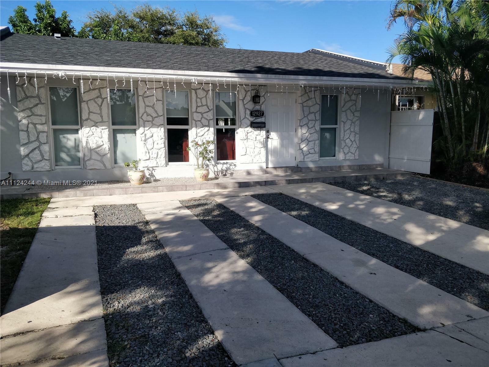 Property Photo:  12927 SW 47th Ter 12927  FL 33175 