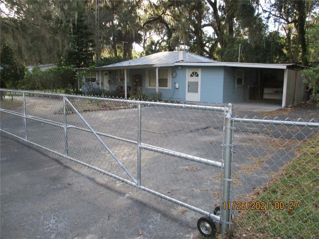 Property Photo:  1883 Cr 422  FL 33538 