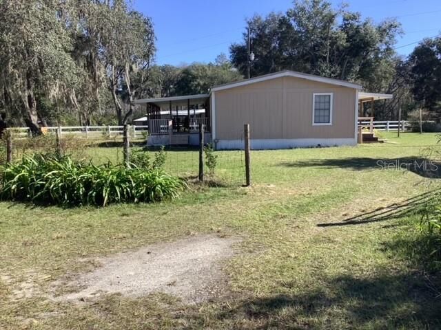 Property Photo:  5448 County Road 561  FL 34714 