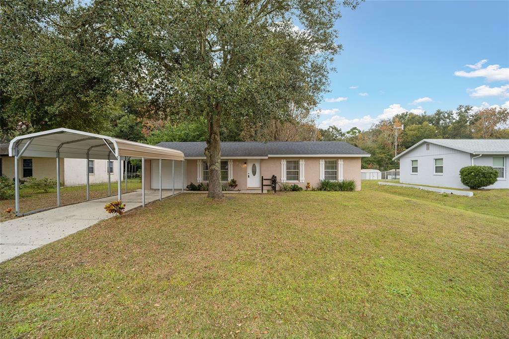 Property Photo:  910 Jacaranda Drive  FL 32159 