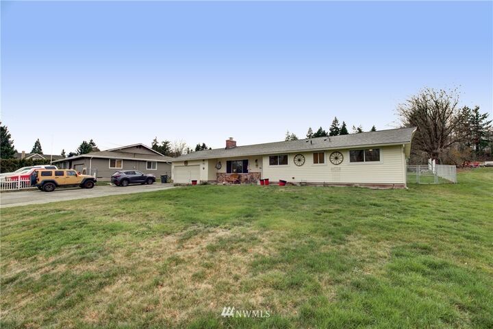 Property Photo: 9310 Woodland Avenue E WA 98371