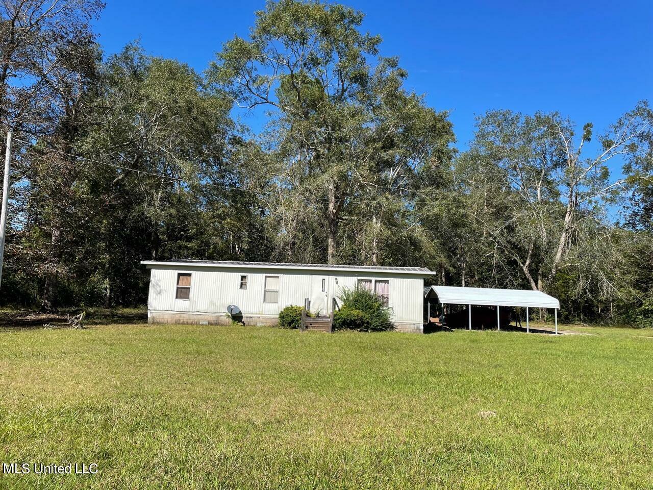 Property Photo:  21785 Saucier Lizana Road  MS 39574 