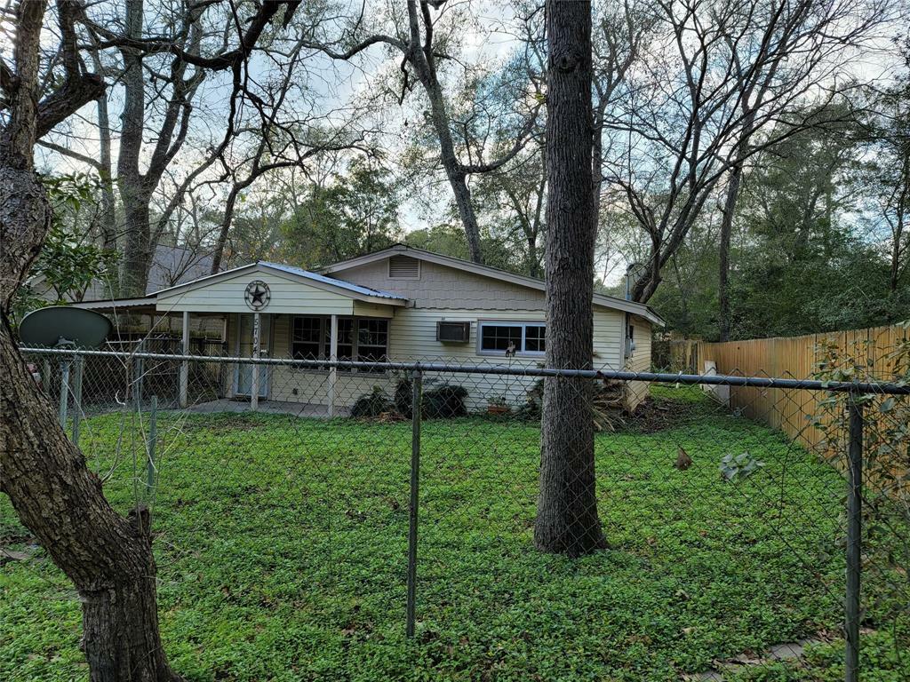 Property Photo: 5704 Pinehurst Drive TX 77316