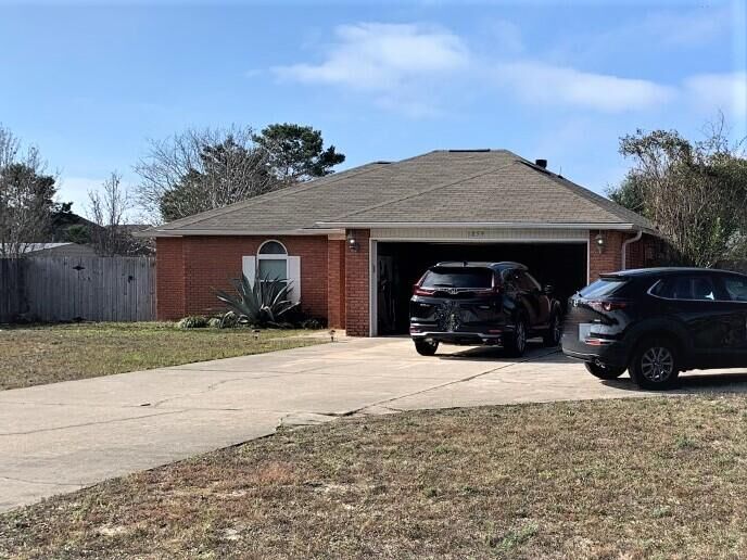 Property Photo:  1859 Coral Street  FL 32566 