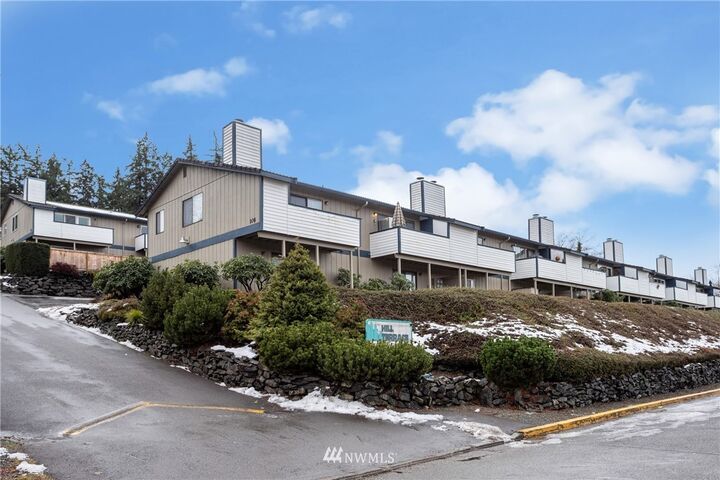 Property Photo: 110 19th Avenue SE 15 WA 98372