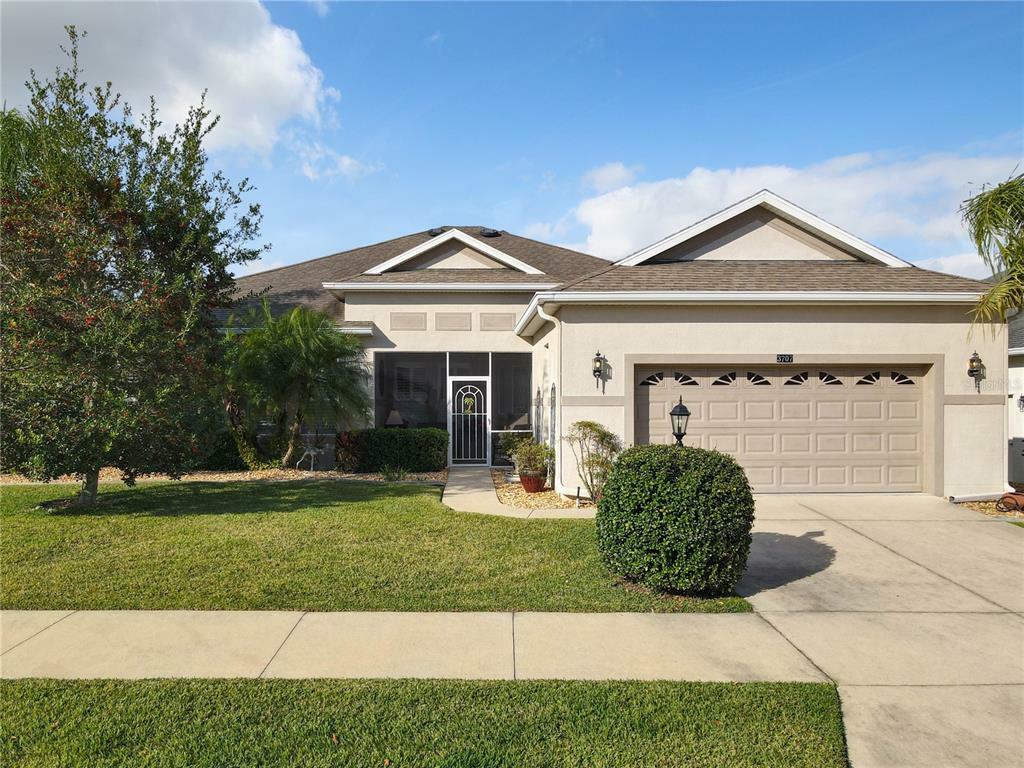 Property Photo:  3707 Belle Rose Drive  FL 34748 