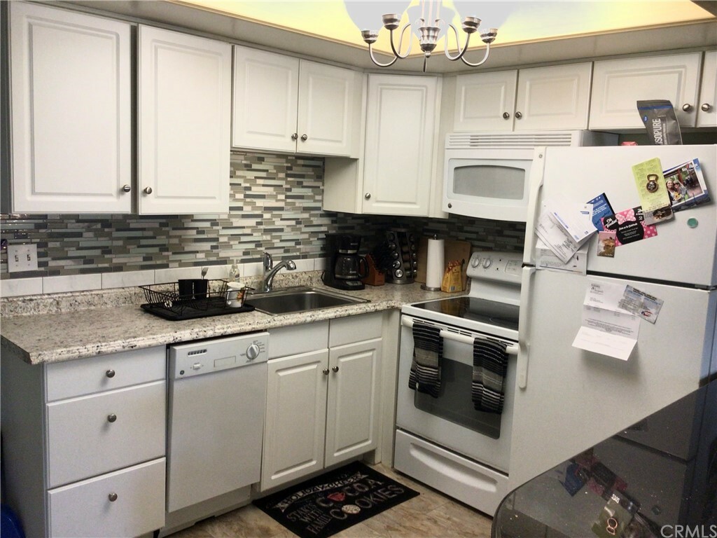 Property Photo:  9649 Spyglass Avenue 90  CA 92240 