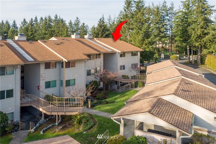 Property Photo:  7606 37th Street W 3L  WA 98466 