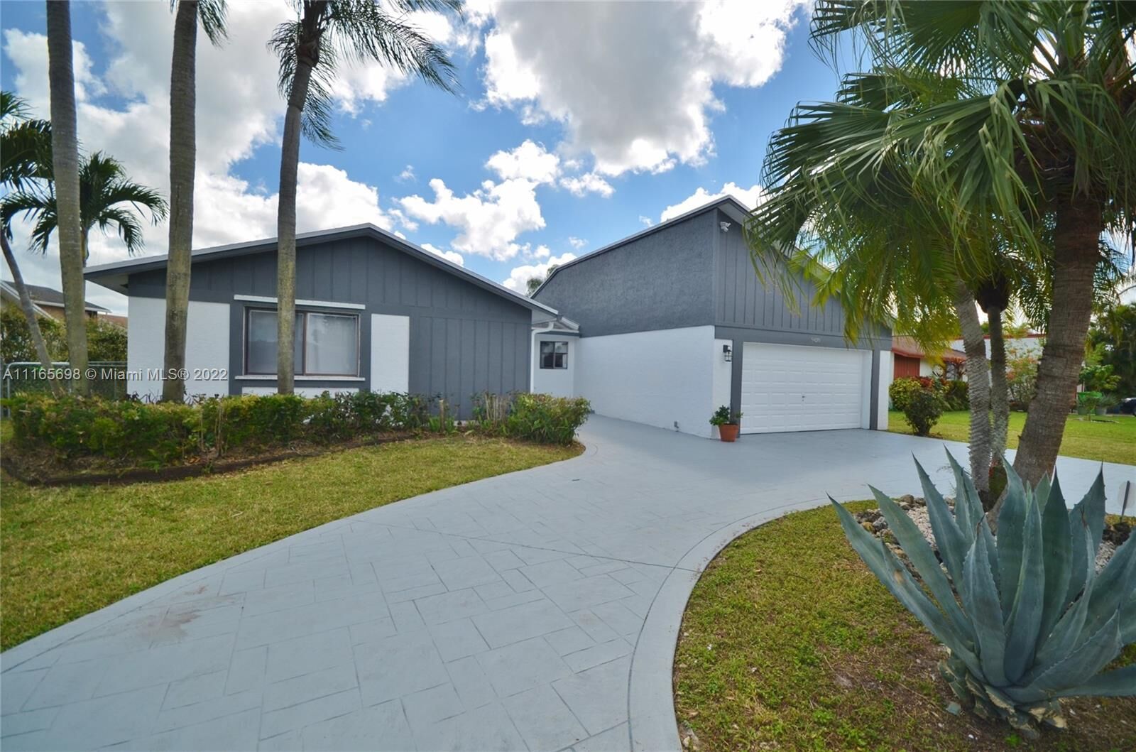 Property Photo: 9428 NW 46th Ct FL 33351