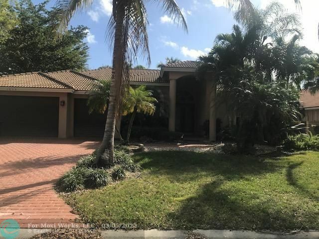 Property Photo: 1859 NW 124th Way FL 33071