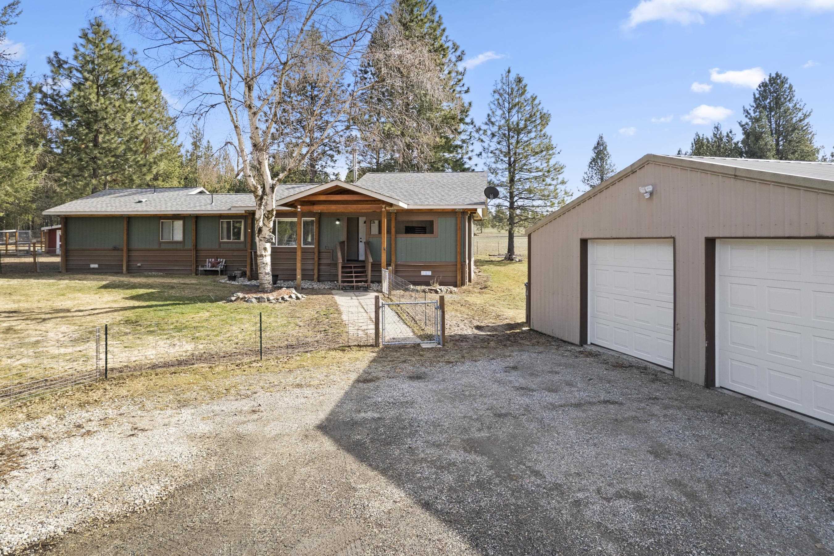 Property Photo: 33724 N Elk Chattaroy Rd WA 99009