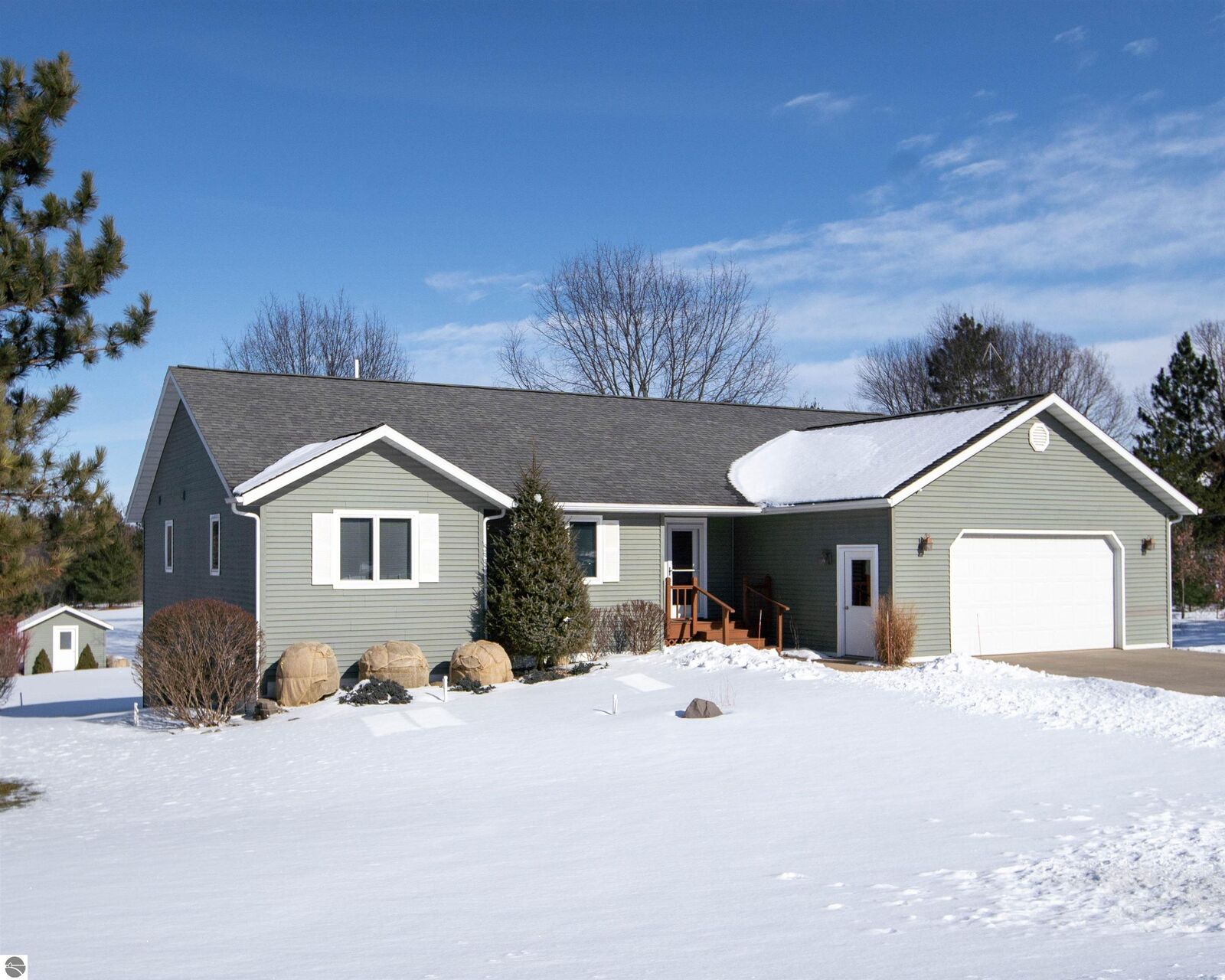 Property Photo:  9095 Windsong Drive  MI 49601 