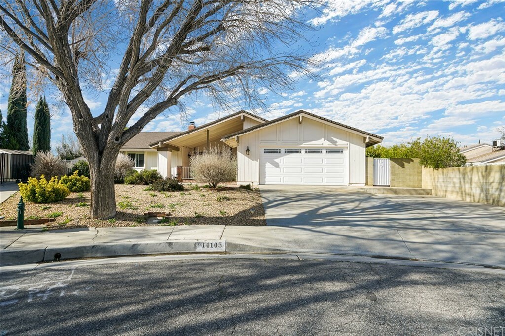 Property Photo:  44105 Planet Circle  CA 93536 