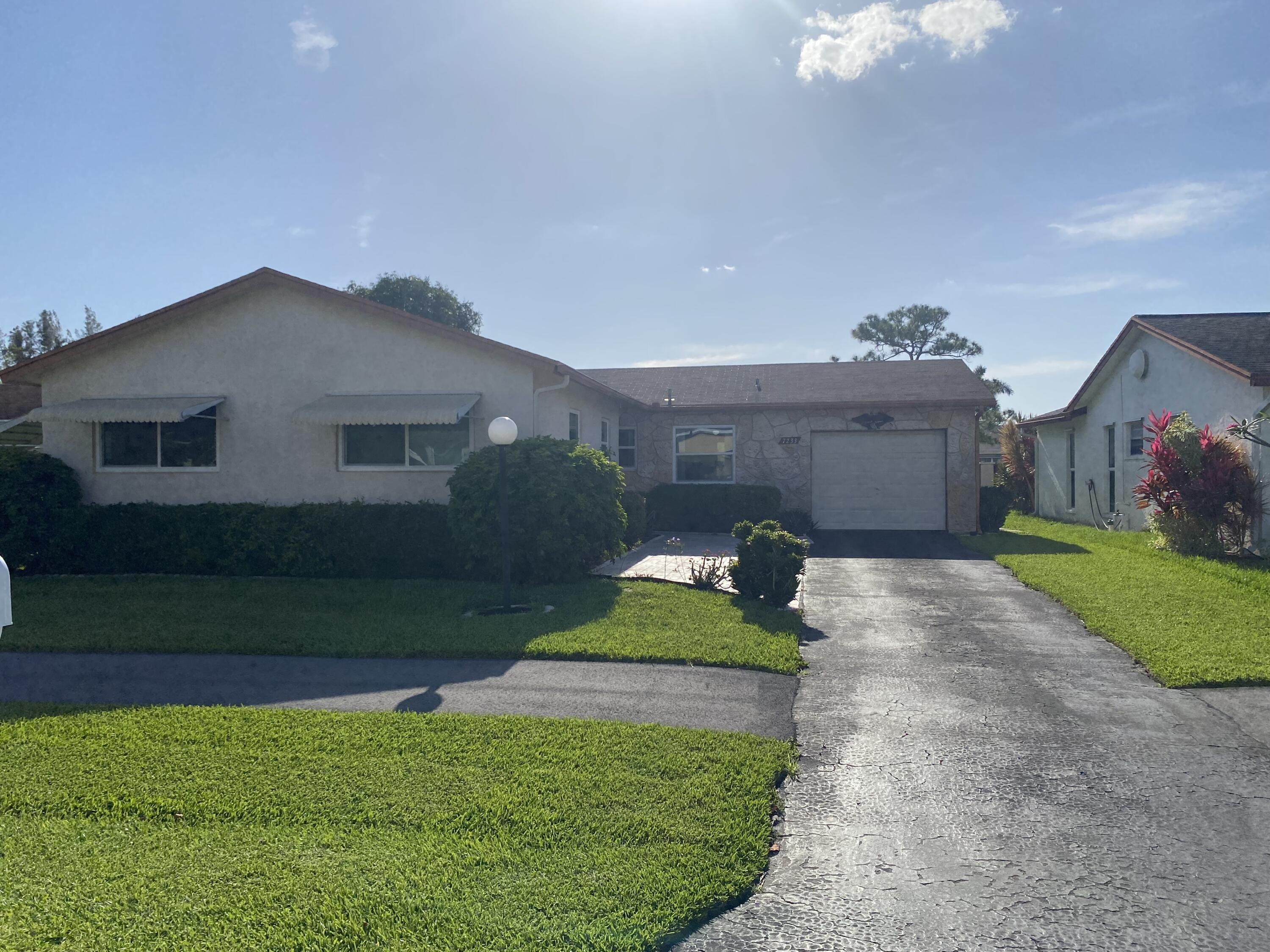 Property Photo:  7233 Pine Park Drive W  FL 33467 