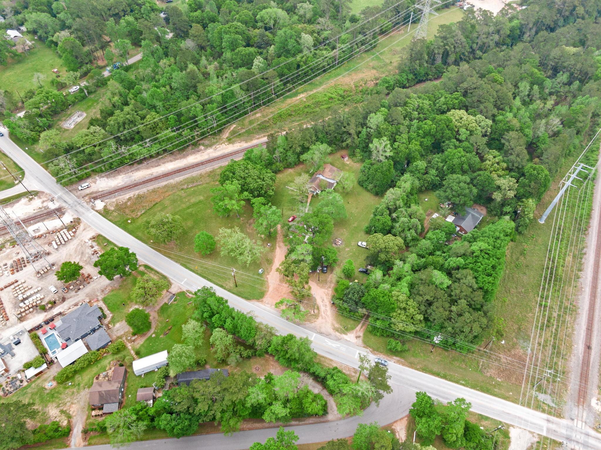 Property Photo: 26032 Hardin Store Rd TX 77354