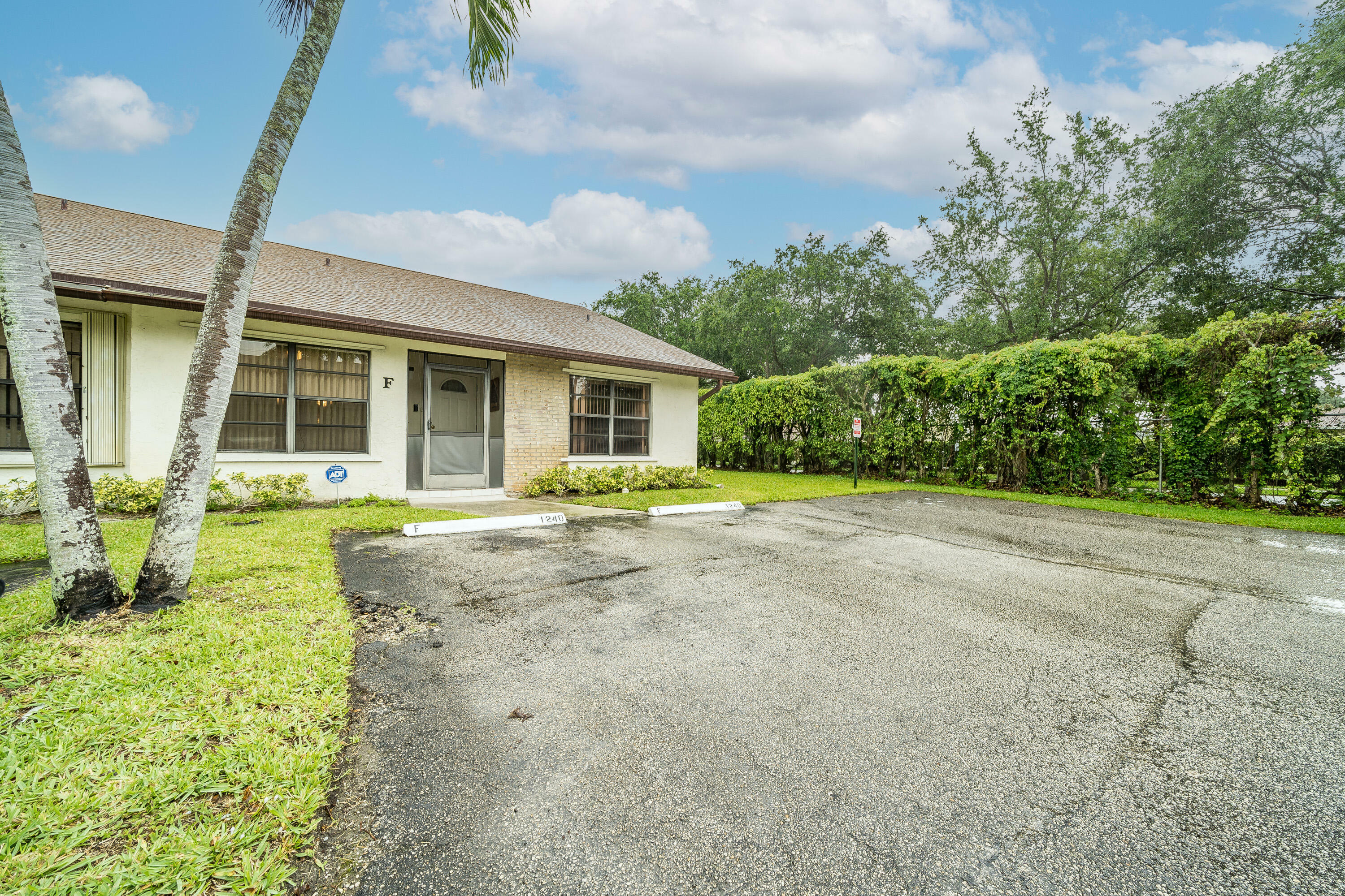 Property Photo:  1240 Parkside Green Drive F  FL 33415 