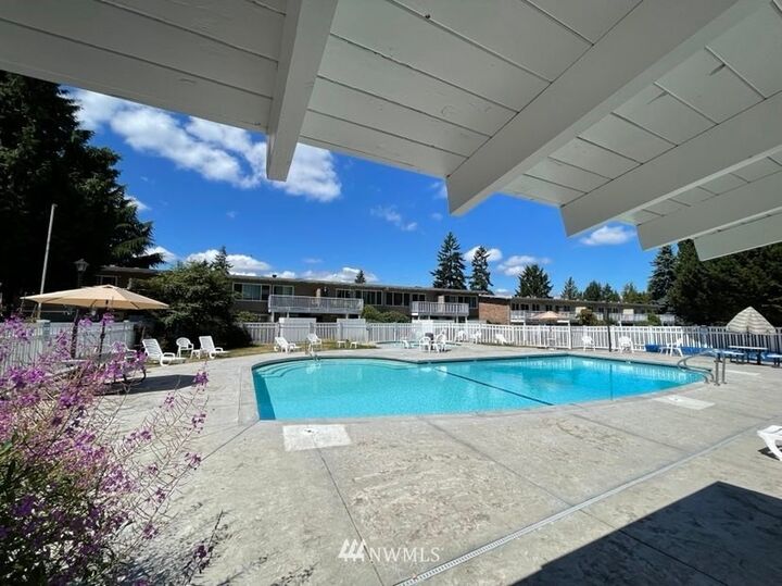 Property Photo: 5711 122nd Place SE 216 WA 98006