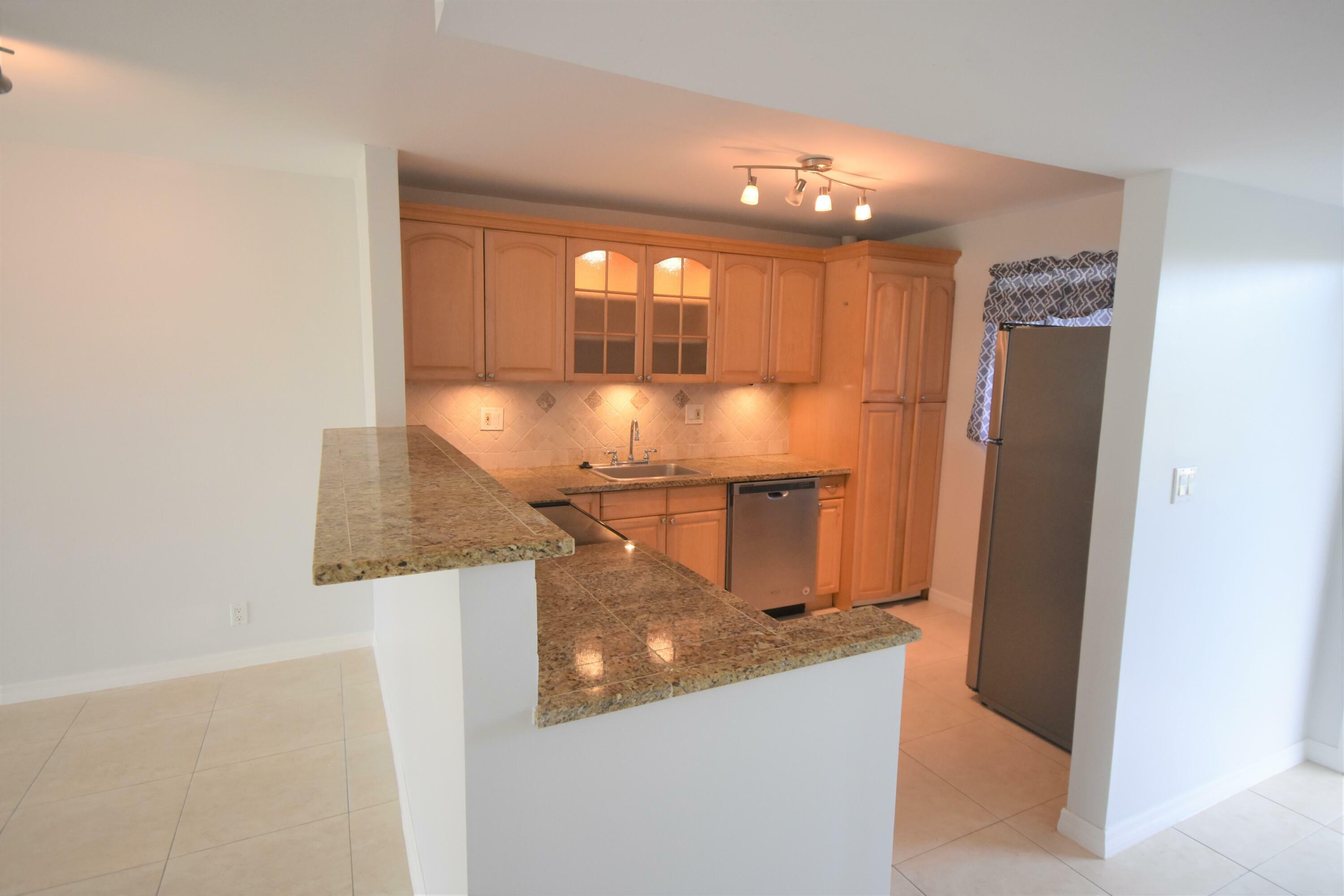 Property Photo: 2600 Fiore Way 204-C FL 33445