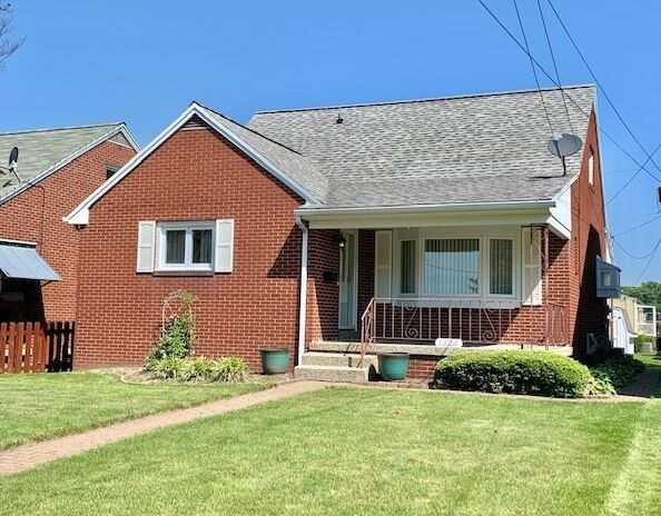 Property Photo:  1323 11th Ave  PA 15065 