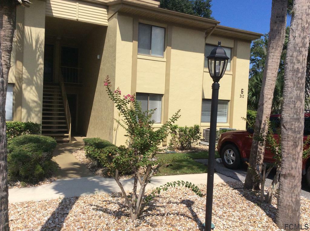 Property Photo:  312 Palm Coast Parkway 101  FL 32137 