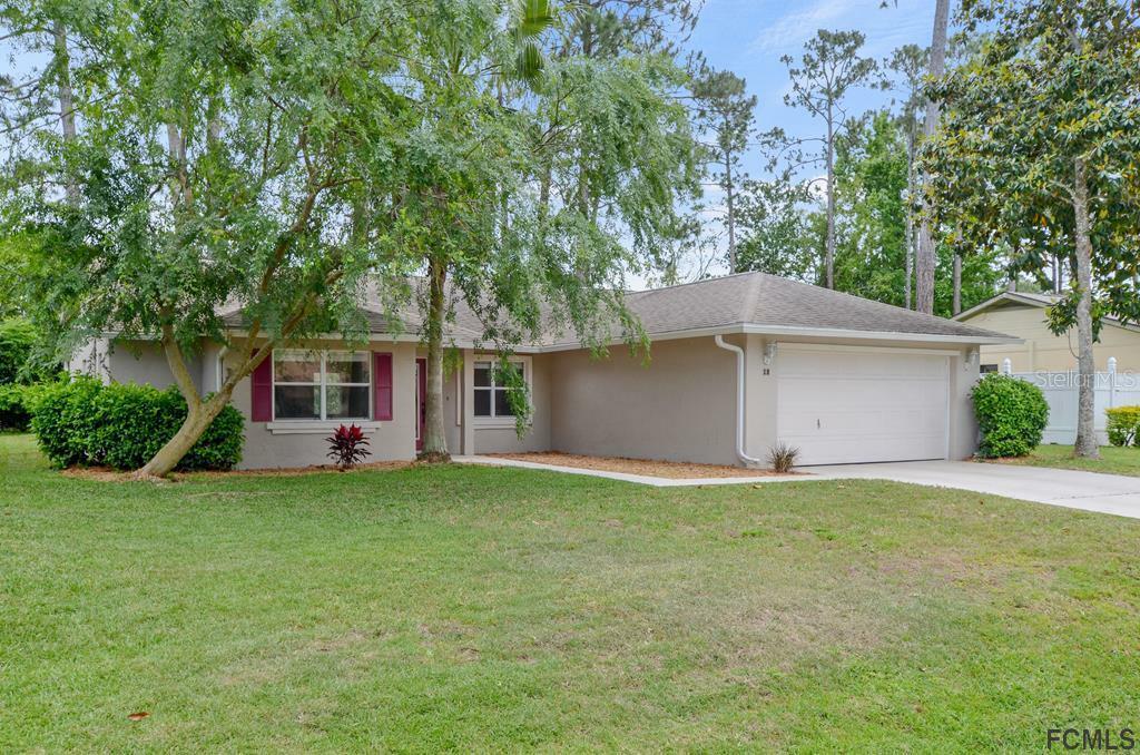 Property Photo: 18 Barkwood Lane FL 32137