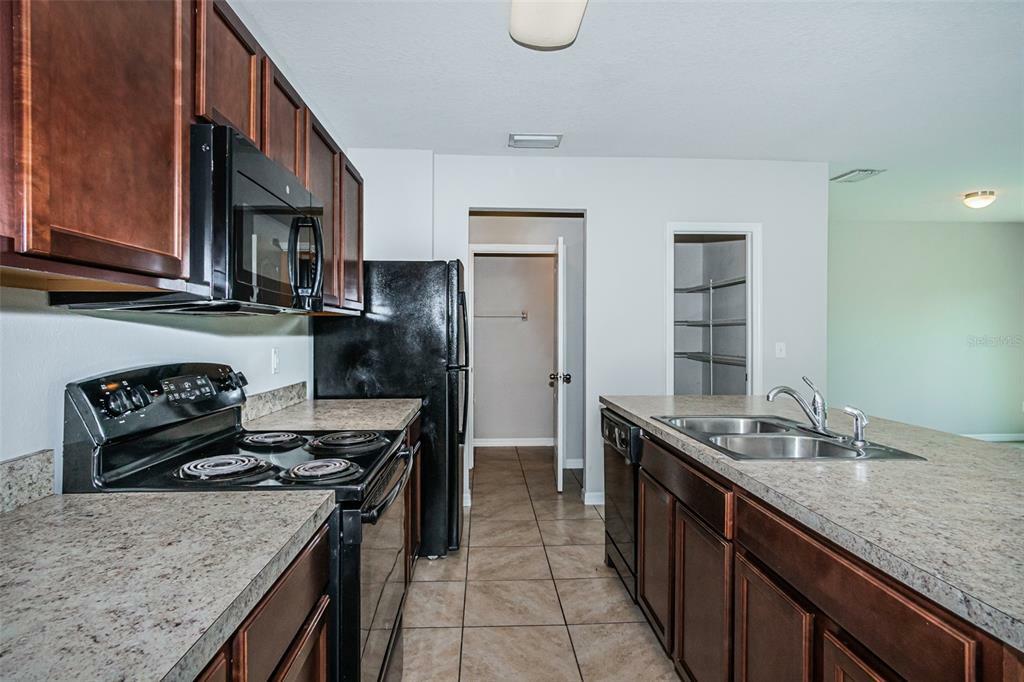 Property Photo: 11932 Grand Kempston Drive FL 33534