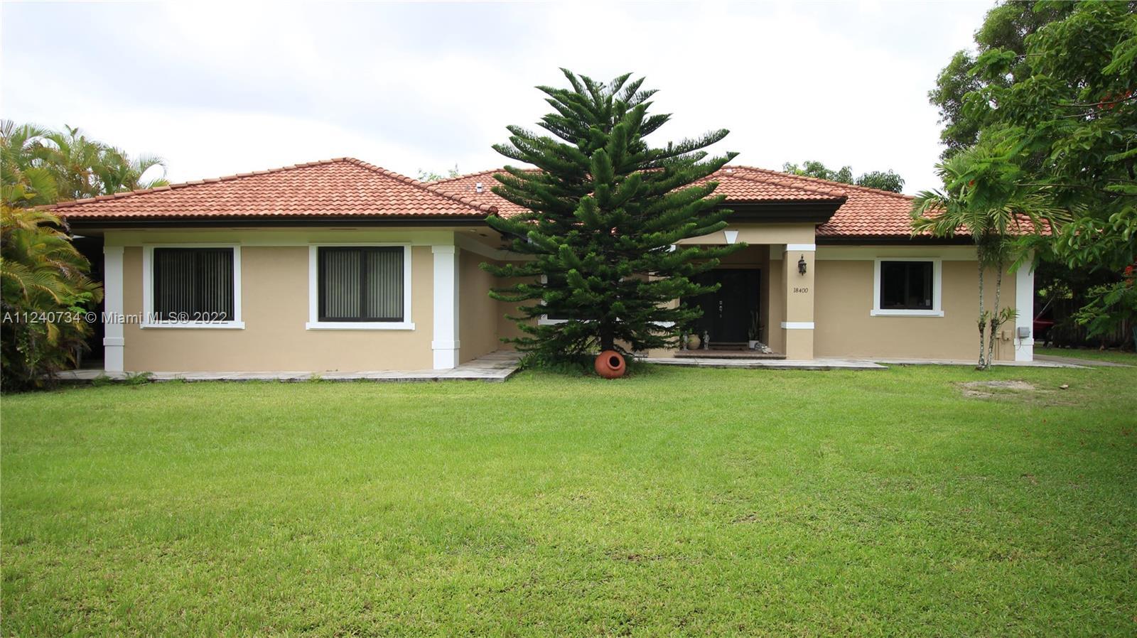 Property Photo:  18400 SW 202nd St  FL 33187 
