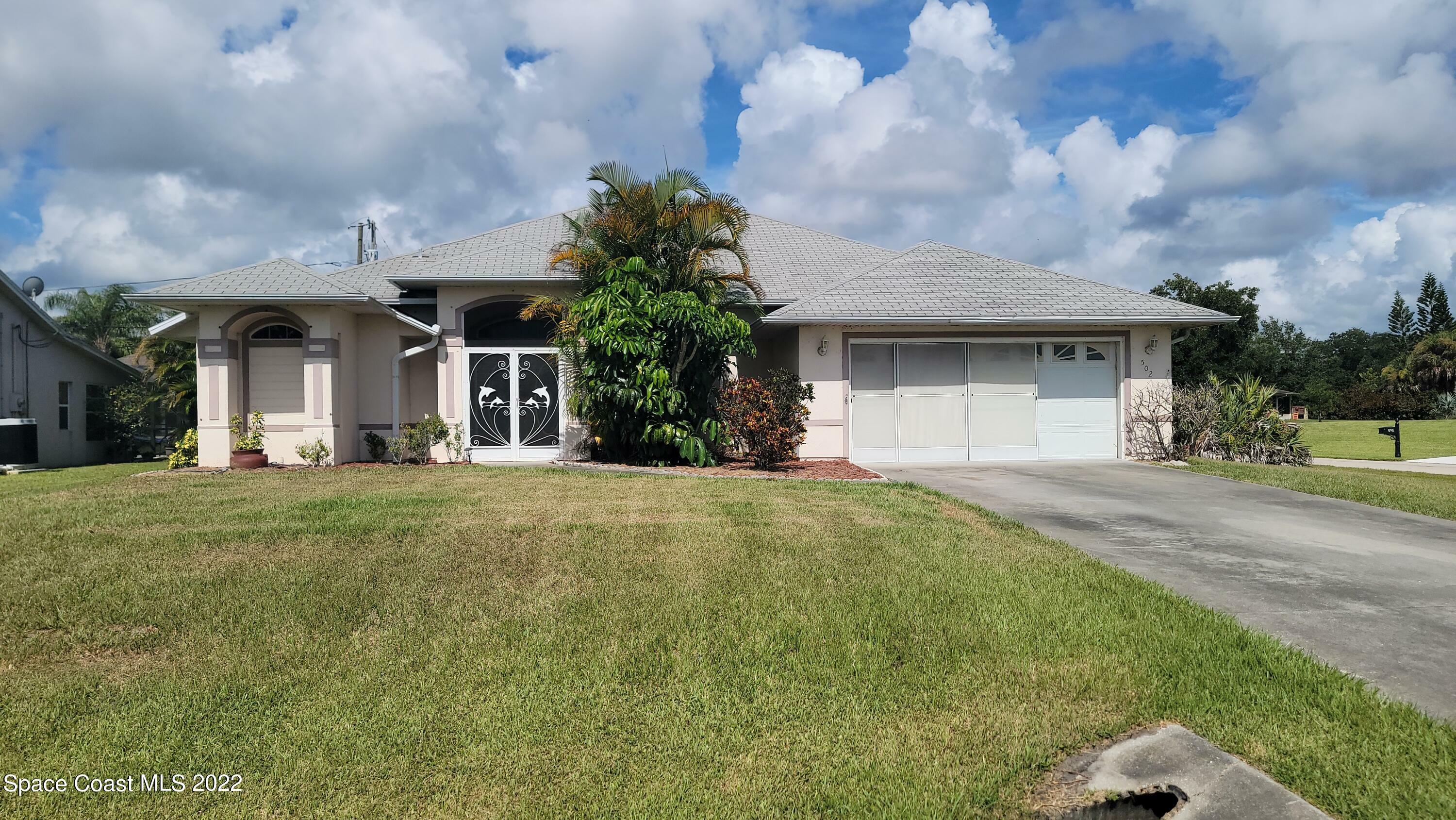 Property Photo:  502 Ponoka Street  FL 32958 