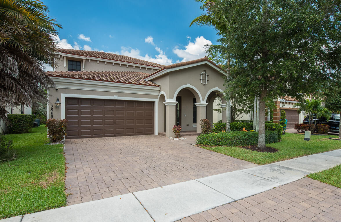 Property Photo: 3865 Aspen Leaf Drive FL 33436