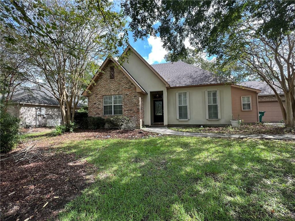 Property Photo:  142 Redbud Court  LA 70433 